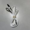 A pair of scissors and some wire are on the table.